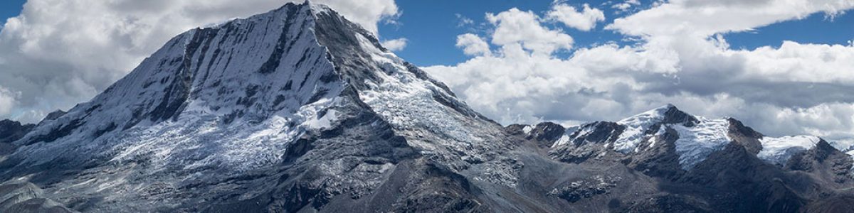 Panorama image of the mountains with snow caps