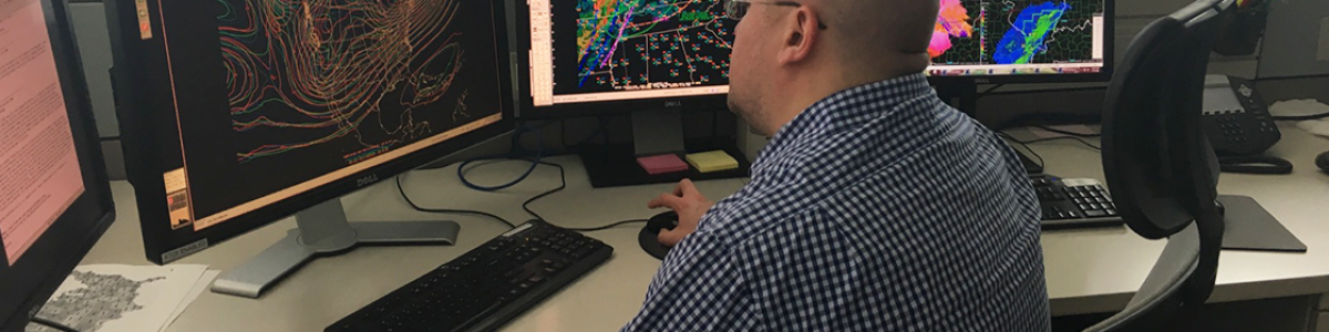 Weather Prediction Center Meteorologist Andrew Orrison works with weather model data